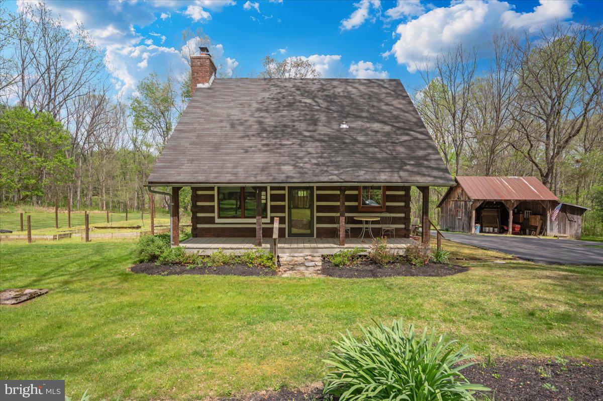 16926 Sprecher Road Sharpsburg, MD 21782 - Photo 63 of 76 Charming log cabin in serene nature.