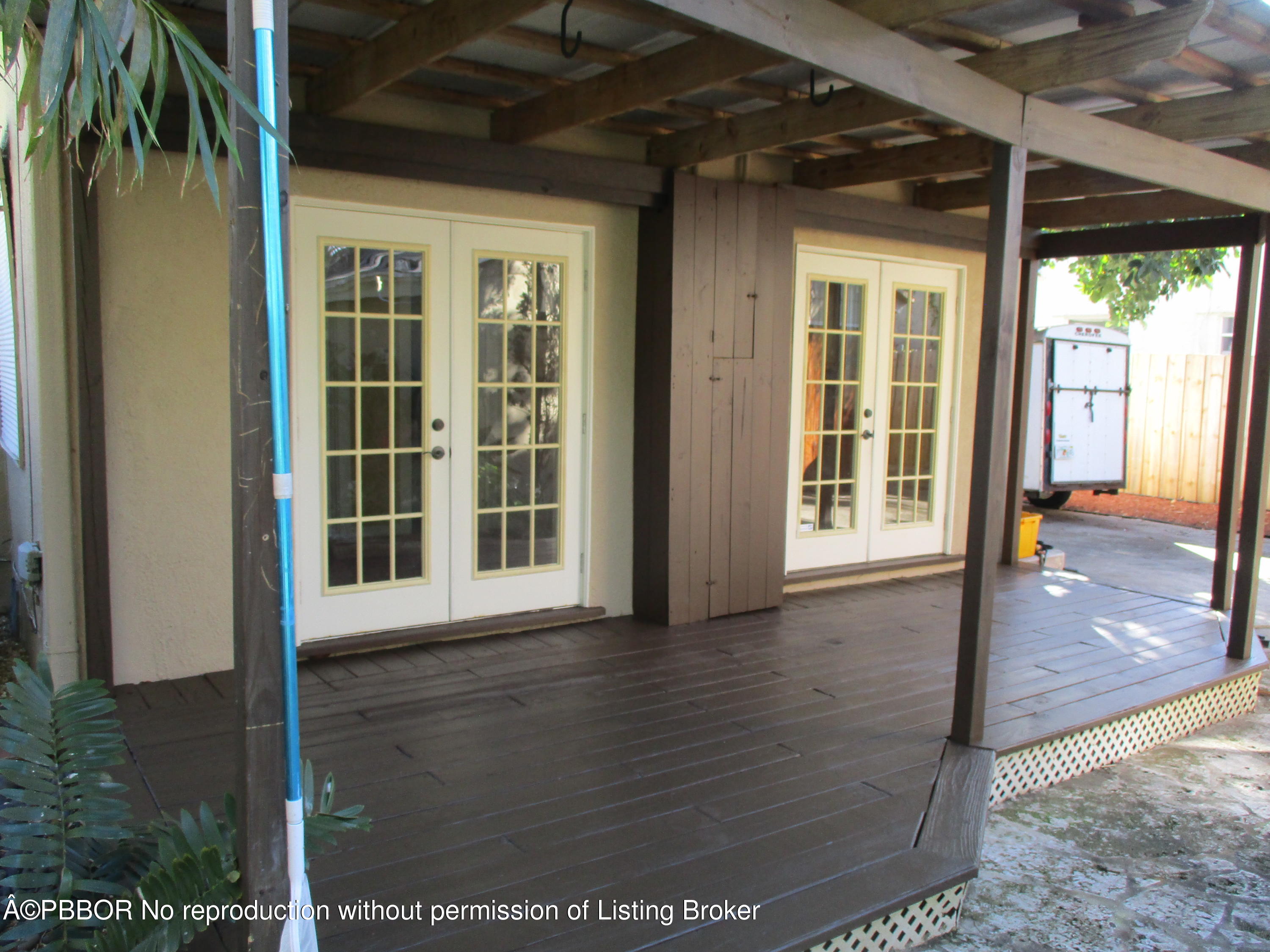 717 Colonial Road West Palm Beach, FL 33405 - Photo 3 of 24 a view of a porch of a house