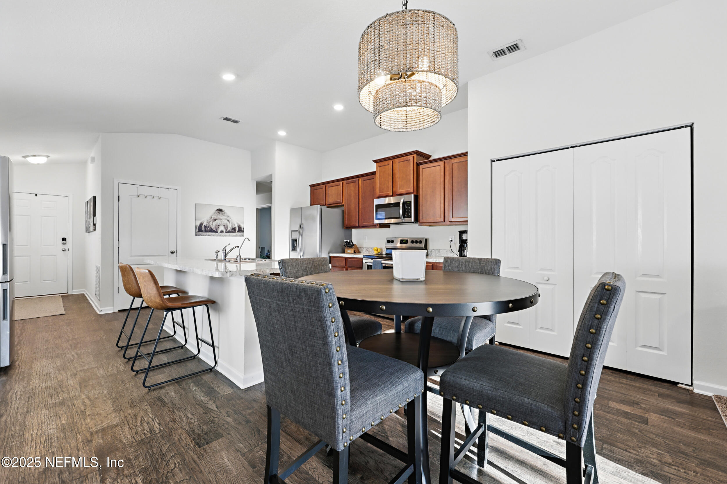 8328 Cape Fox Drive Jacksonville, FL 32222 - Photo 12 of 34 a view of a dining room with furniture