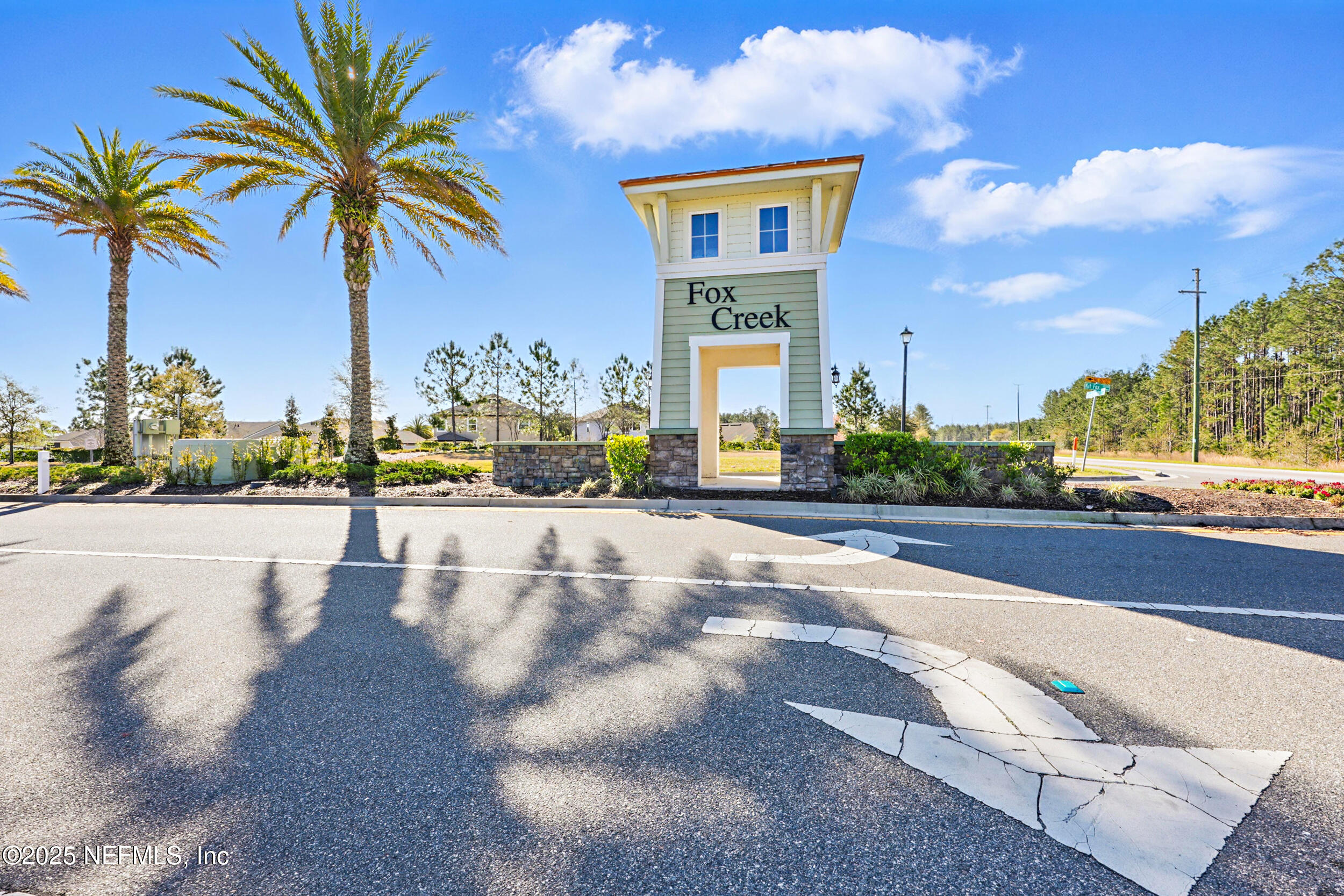 8328 Cape Fox Drive Jacksonville, FL 32222 - Photo 24 of 34 a view of a swimming pool and a yard