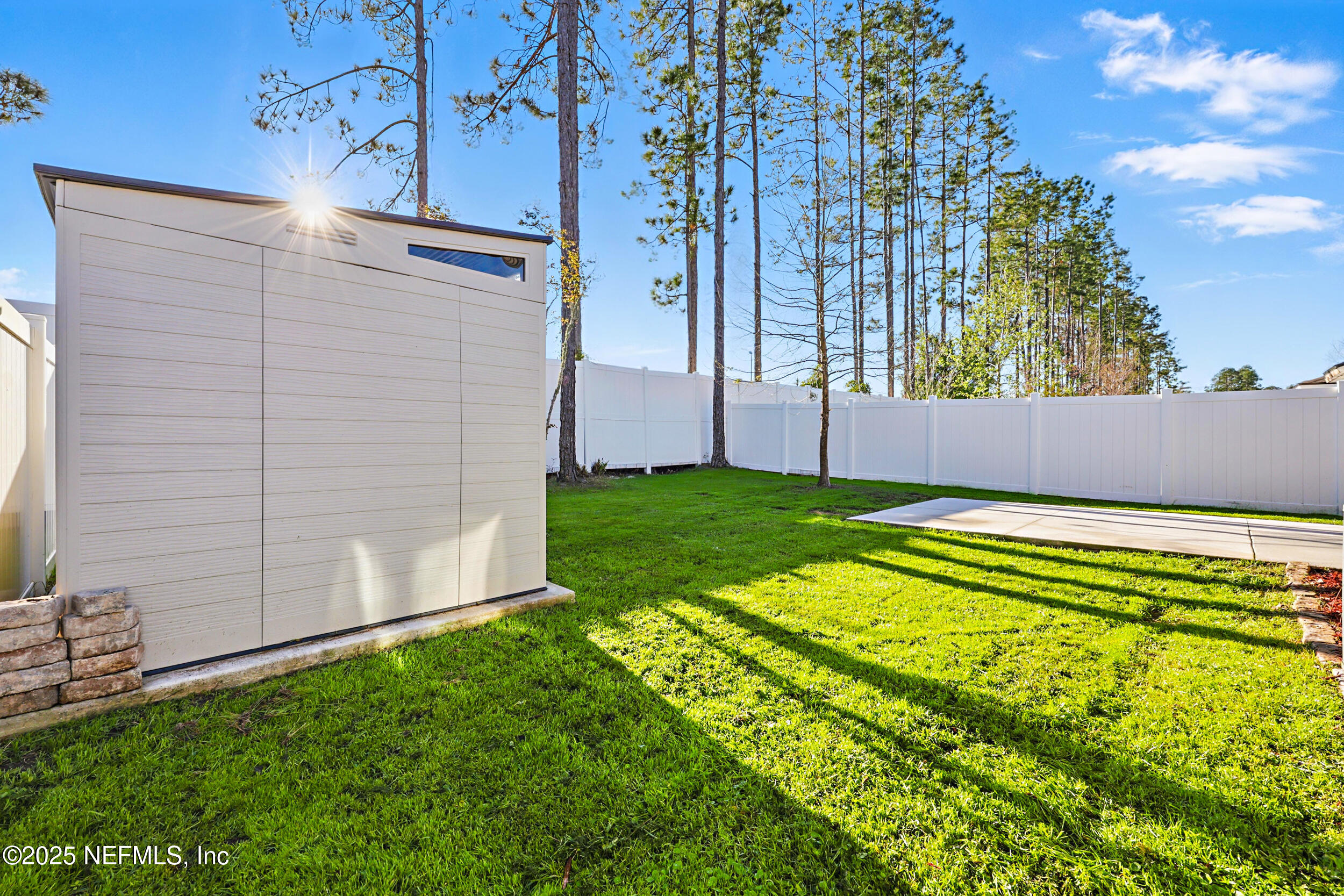 8328 Cape Fox Drive Jacksonville, FL 32222 - Photo 26 of 34 a view of an outdoor space and a yard