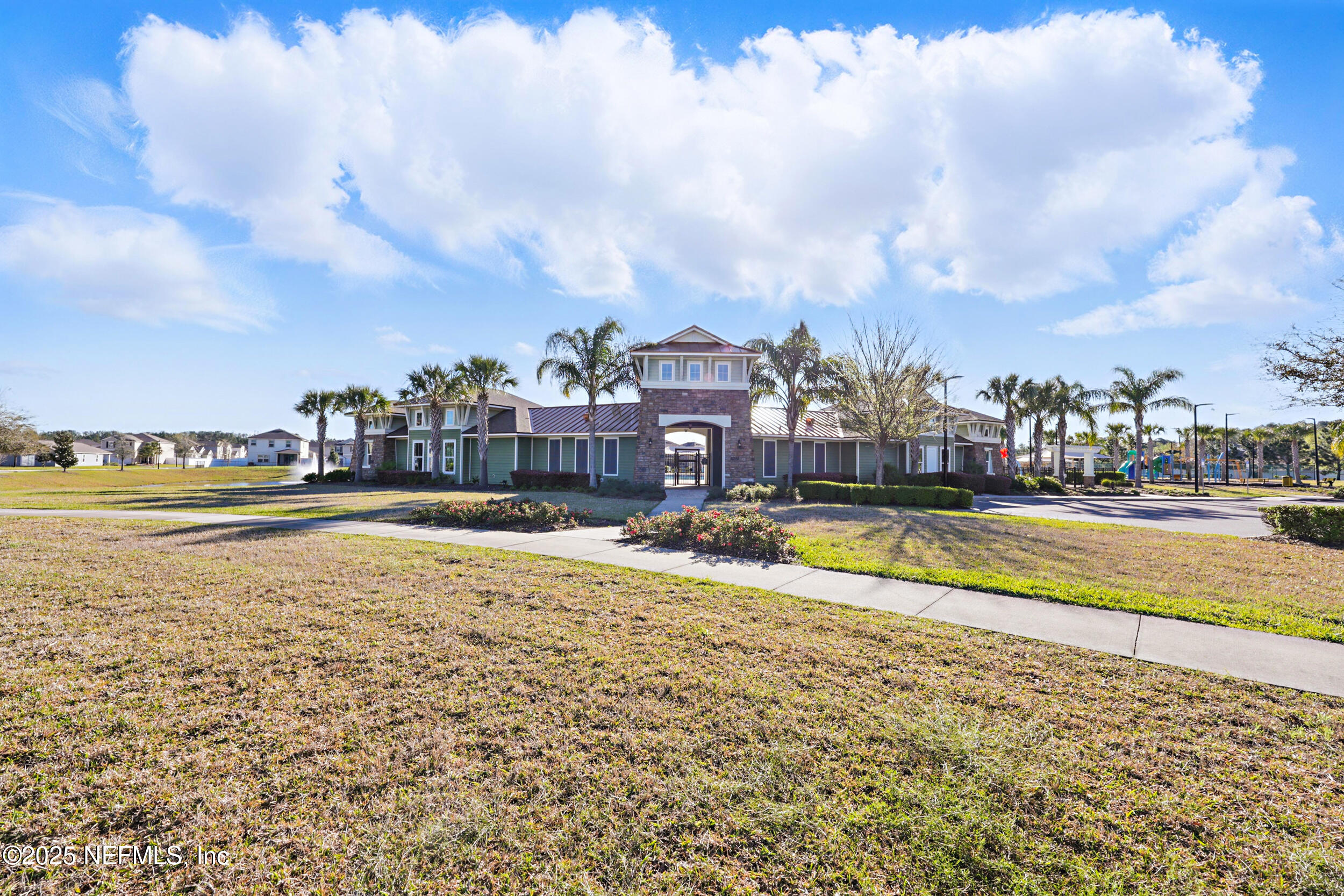8328 Cape Fox Drive Jacksonville, FL 32222 - Photo 28 of 34 a view of a swimming pool with a yard