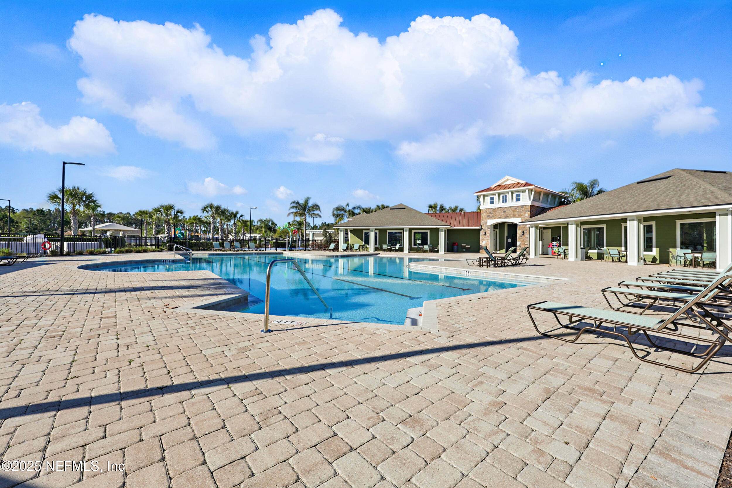 8328 Cape Fox Drive Jacksonville, FL 32222 - Photo 30 of 34 a view of swimming pool with lounge chair and large trees