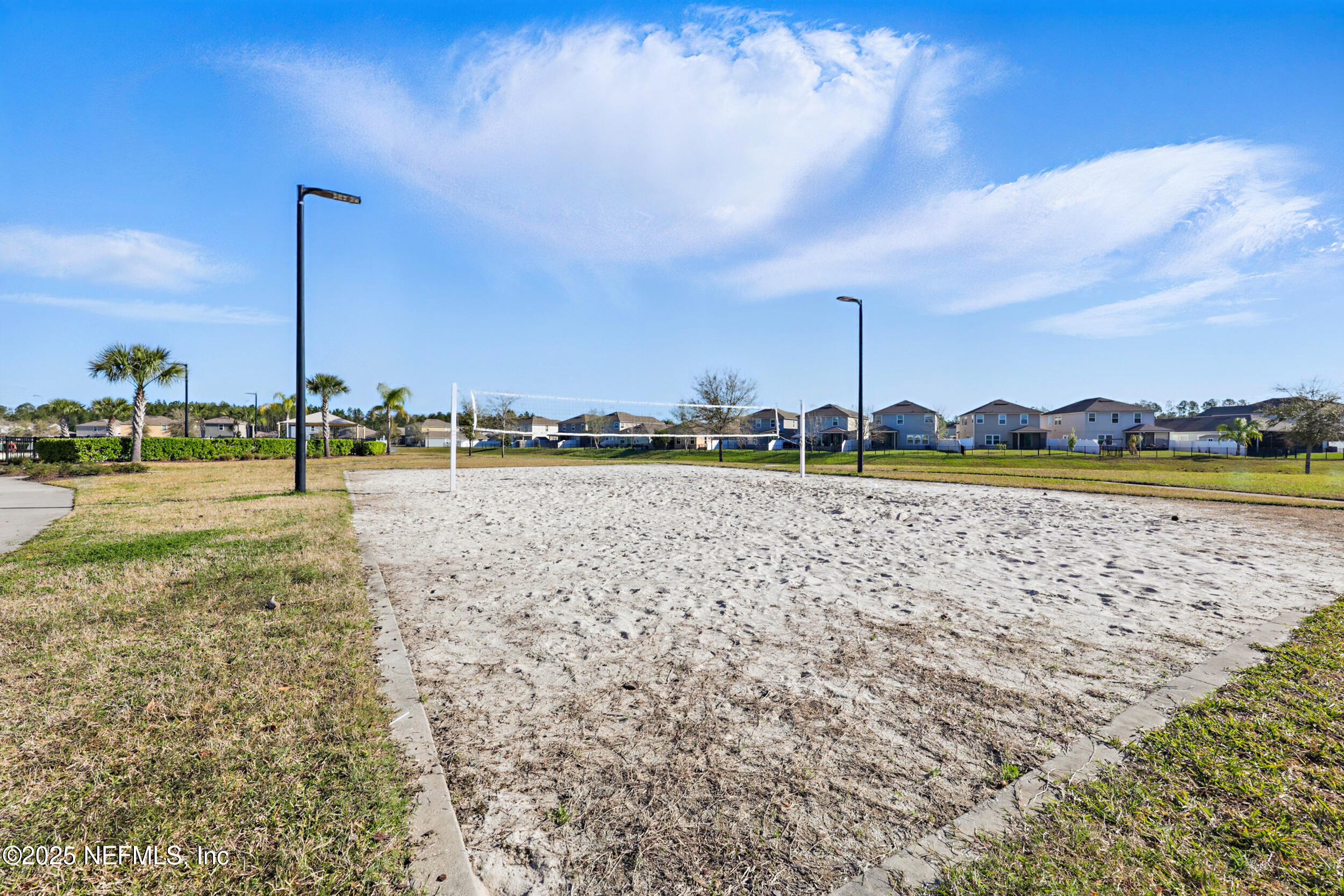 8328 Cape Fox Drive Jacksonville, FL 32222 - Photo 31 of 34 a view of a lake with houses in the background