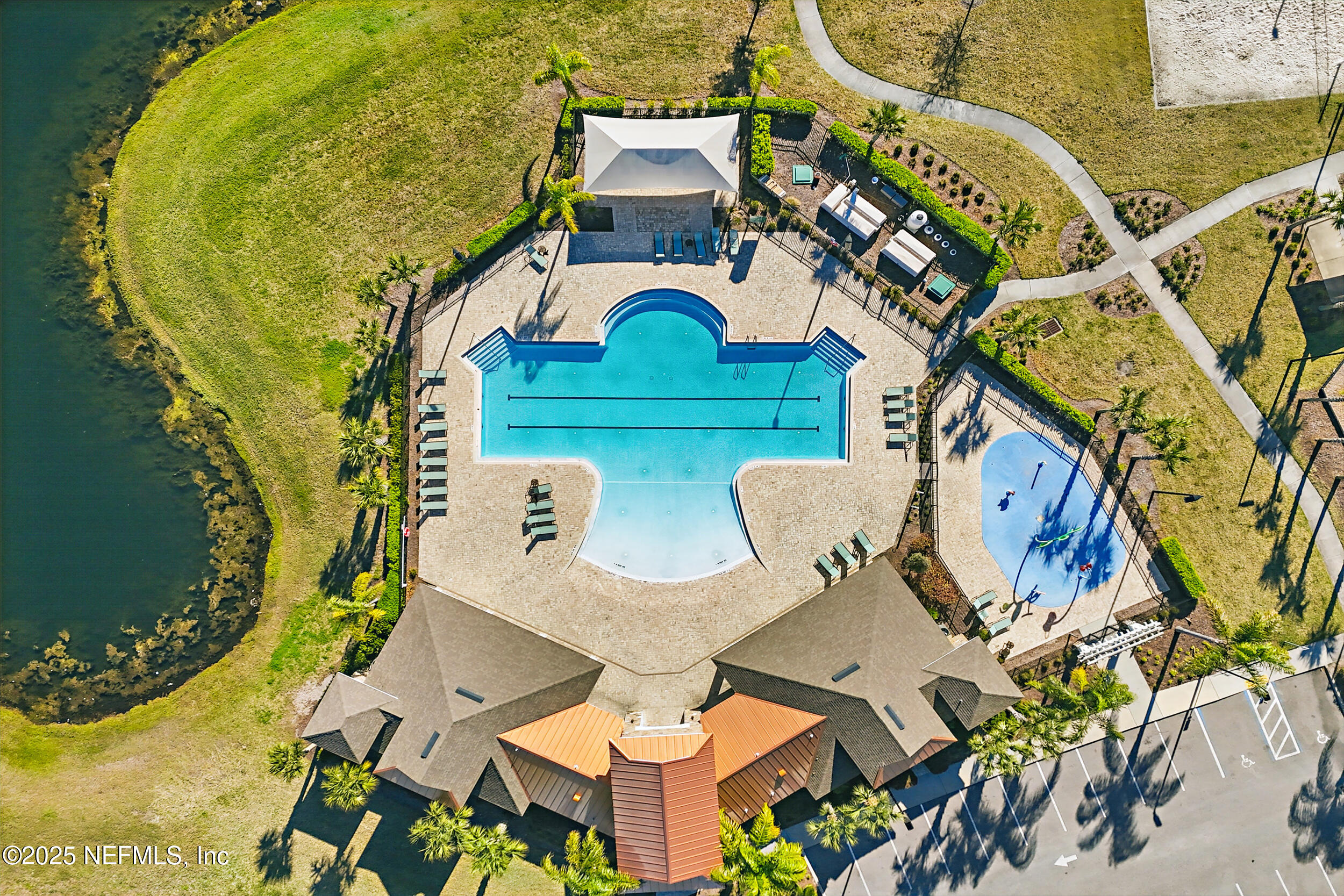 8328 Cape Fox Drive Jacksonville, FL 32222 - Photo 33 of 34 an aerial view of a house with swimming pool