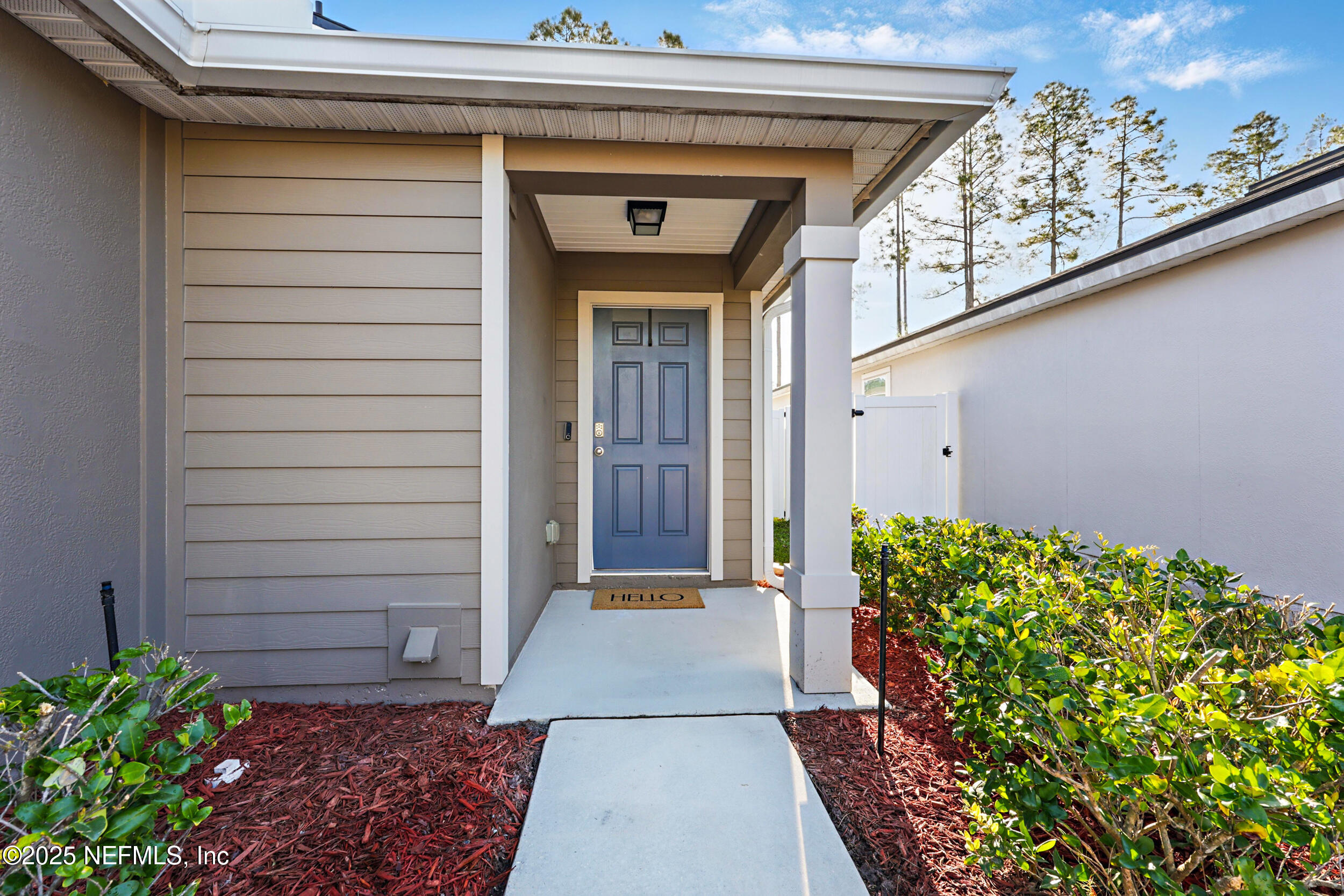 8328 Cape Fox Drive Jacksonville, FL 32222 - Photo 4 of 34 a view of a entryway door of the house