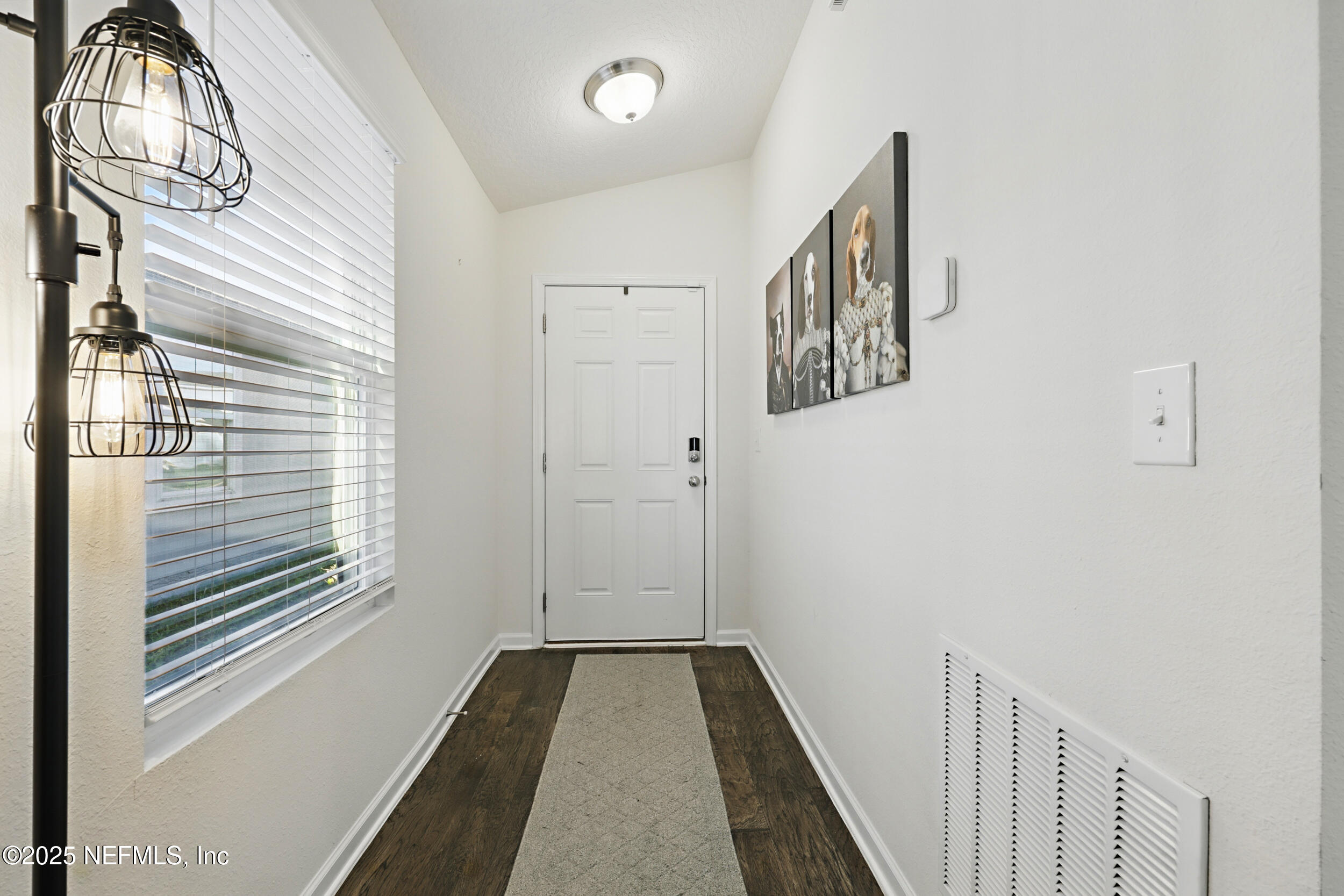 8328 Cape Fox Drive Jacksonville, FL 32222 - Photo 6 of 34 a view of a hallway