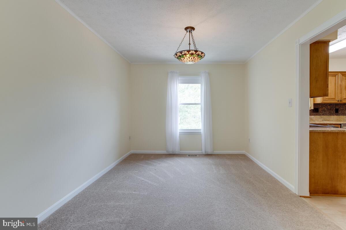 6456 Skipton Drive Hanover, MD 21076 - Photo 11 of 75 Dining room view from living room