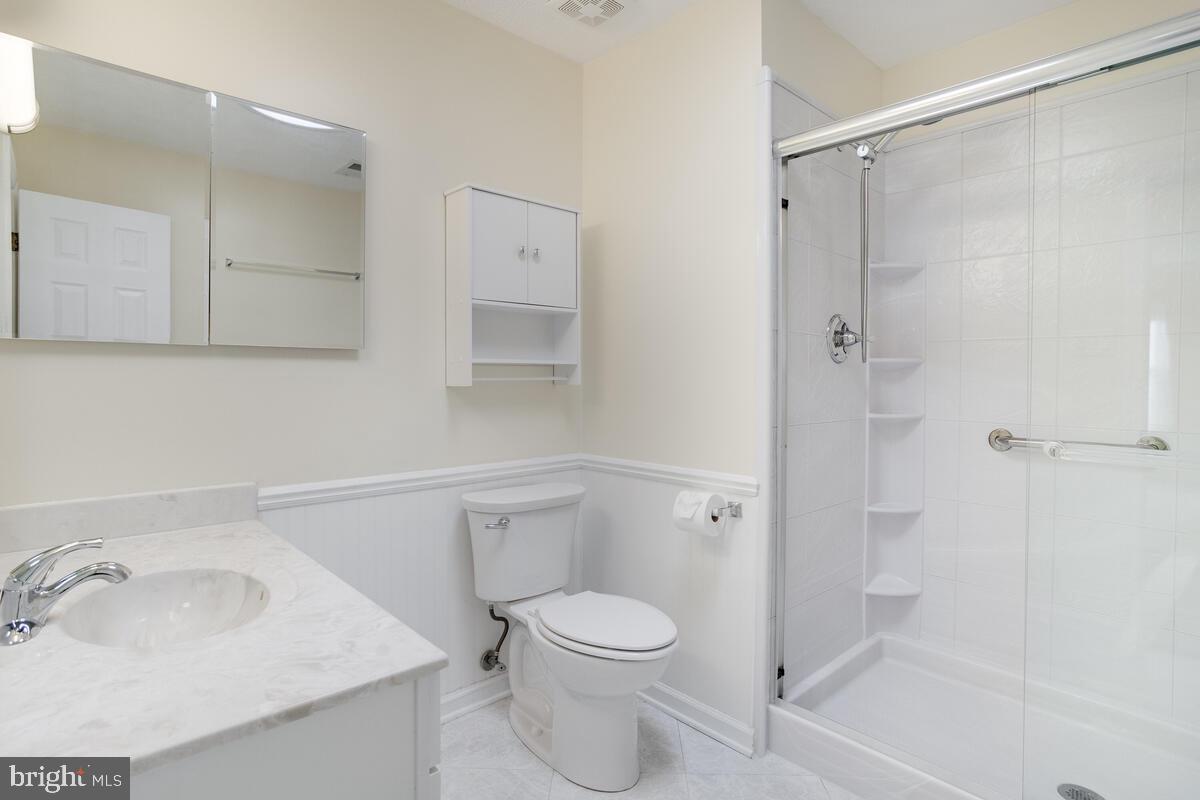 6456 Skipton Drive Hanover, MD 21076 - Photo 34 of 75 Primary bath featuring 3x5 shower /4 shelf caddy