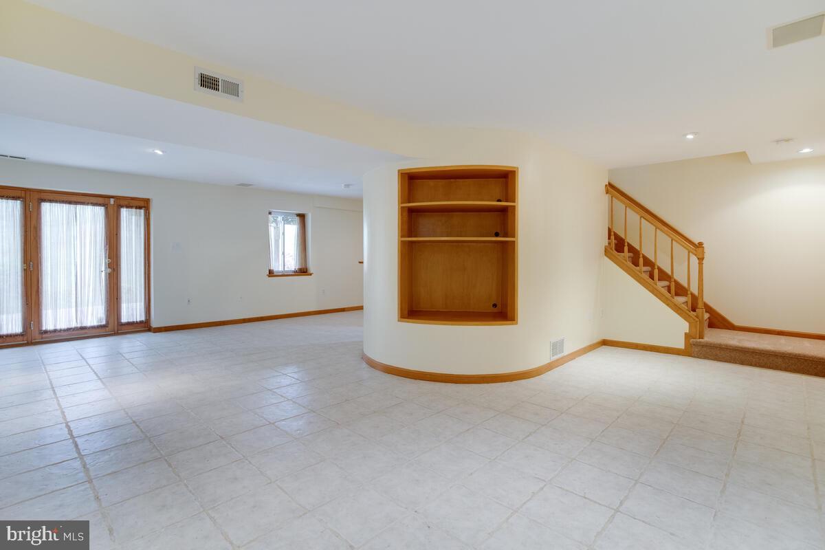 6456 Skipton Drive Hanover, MD 21076 - Photo 48 of 75 Rounded wall entertainment center