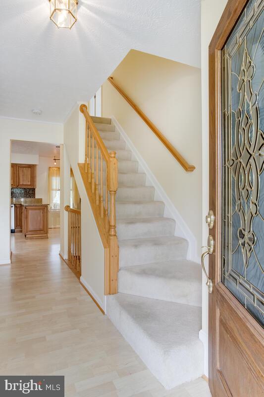 6456 Skipton Drive Hanover, MD 21076 - Photo 6 of 75 Foyer looking into kitchen