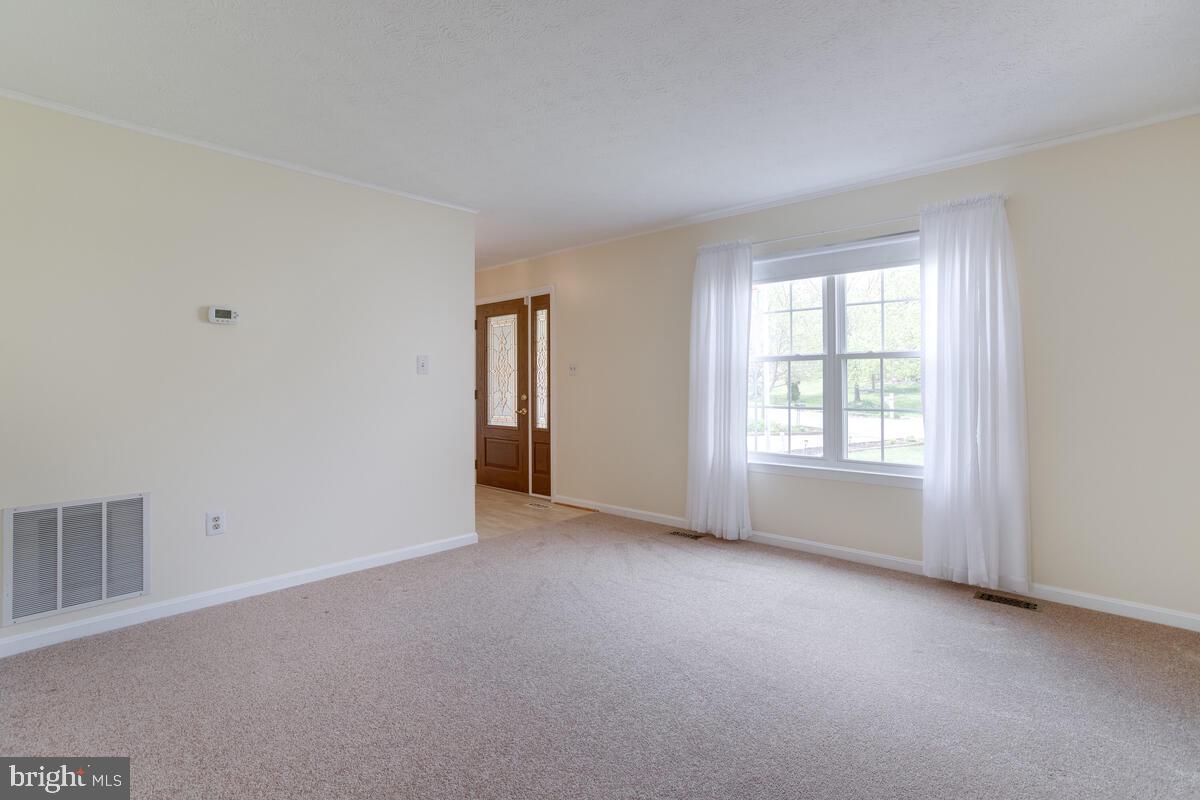 6456 Skipton Drive Hanover, MD 21076 - Photo 10 of 75 Living room view from dining room