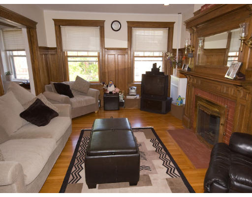 16 Claflin Road, Unit 2 Brookline, MA 02445 - Photo 4 of 10 a living room with furniture fireplace and flat screen tv