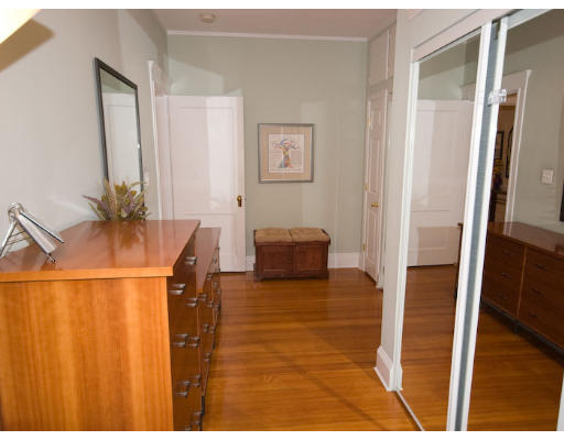 16 Claflin Road, Unit 2 Brookline, MA 02445 - Photo 7 of 10 a living room with a bed and a table