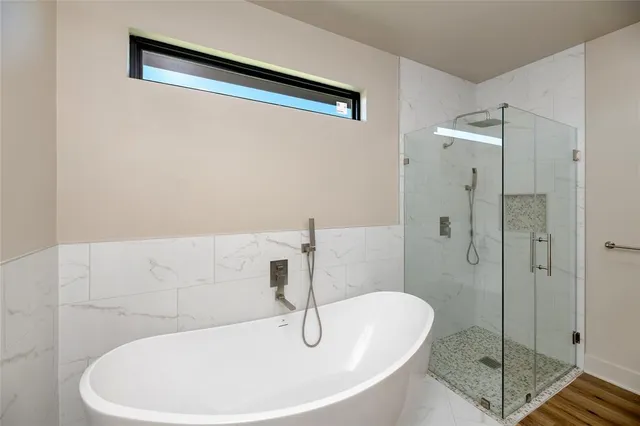 a bathroom with a sink and shower