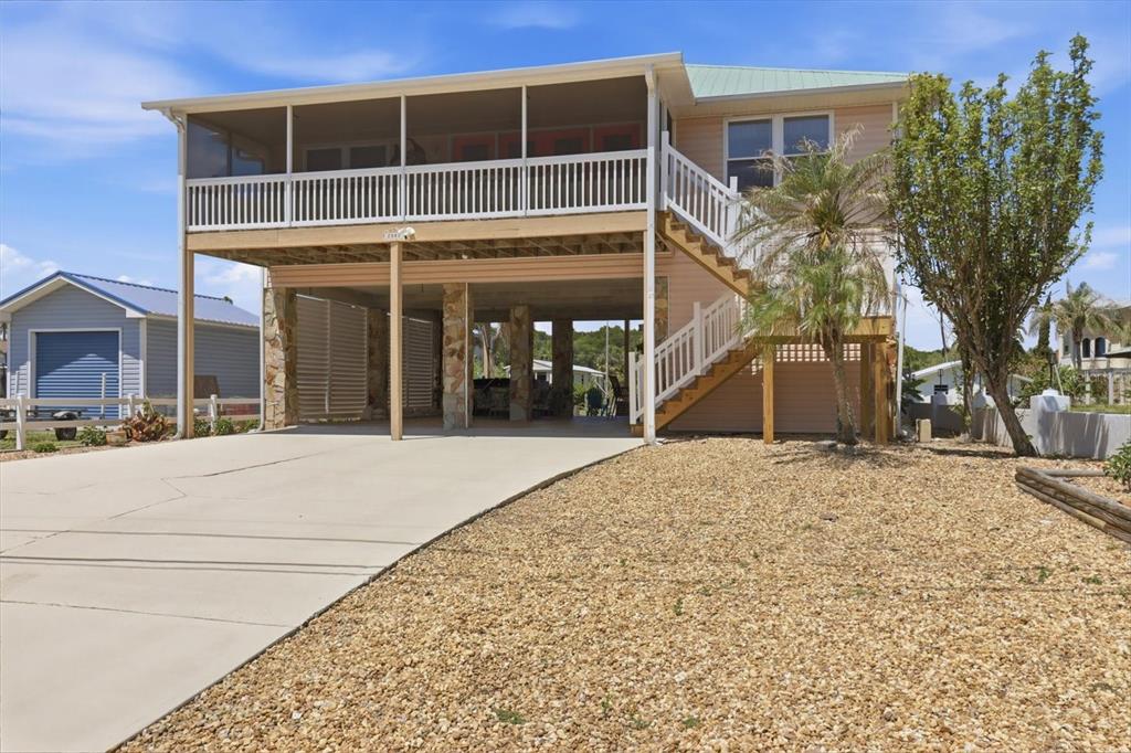 2882 North Comanche Point Crystal River, FL 34429 - Photo 1 of 39 a house view with a outdoor space
