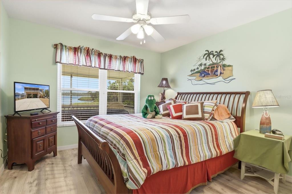 2882 North Comanche Point Crystal River, FL 34429 - Photo 11 of 39 a bedroom with a bed and a window