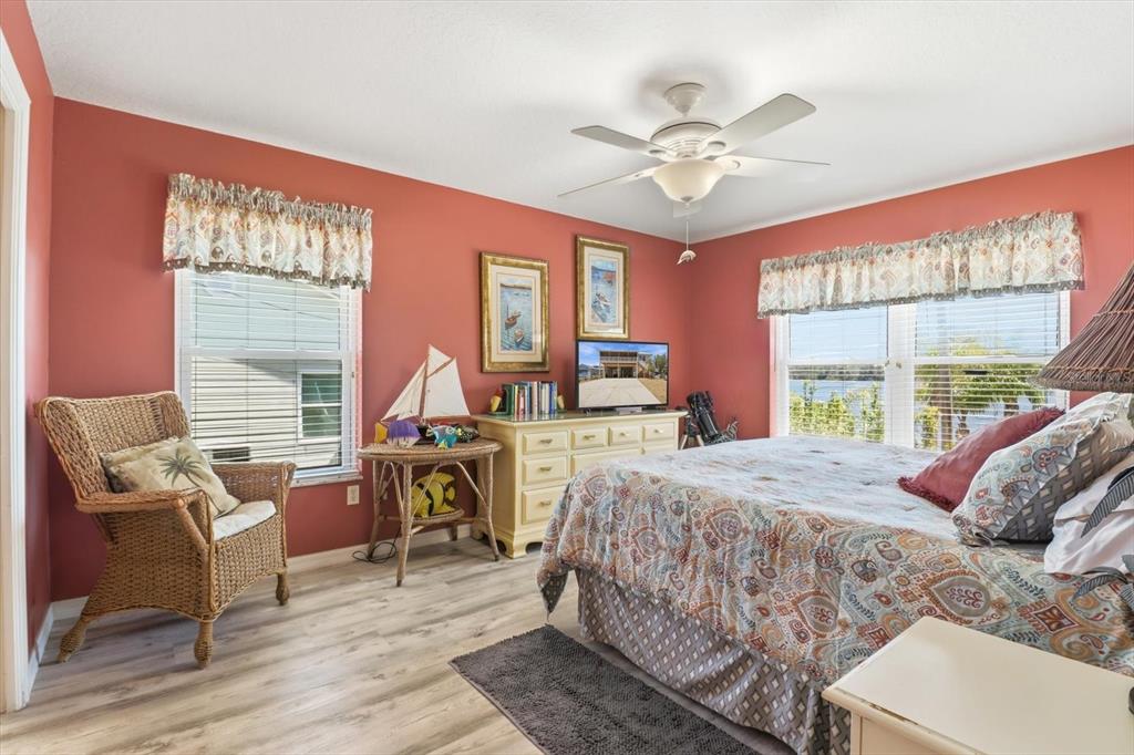 2882 North Comanche Point Crystal River, FL 34429 - Photo 13 of 39 a bed room with a bed and a chair