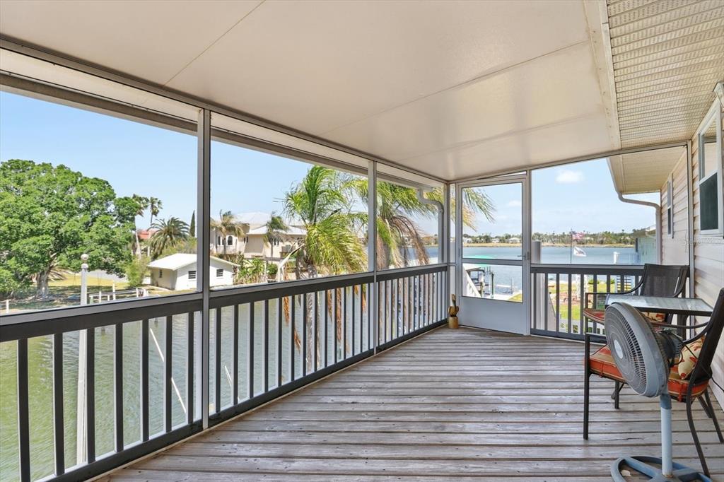 2882 North Comanche Point Crystal River, FL 34429 - Photo 18 of 39 a view of a balcony with wooden floor