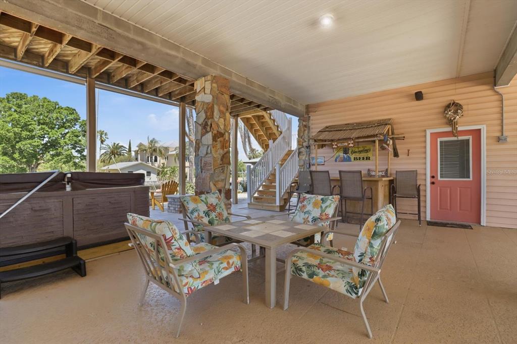 2882 North Comanche Point Crystal River, FL 34429 - Photo 21 of 39 a dining room with furniture and a window