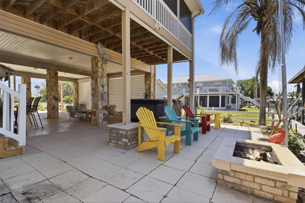 2882 North Comanche Point Crystal River, FL 34429 - Photo 26 of 39 a view of a chairs and tables in the patio
