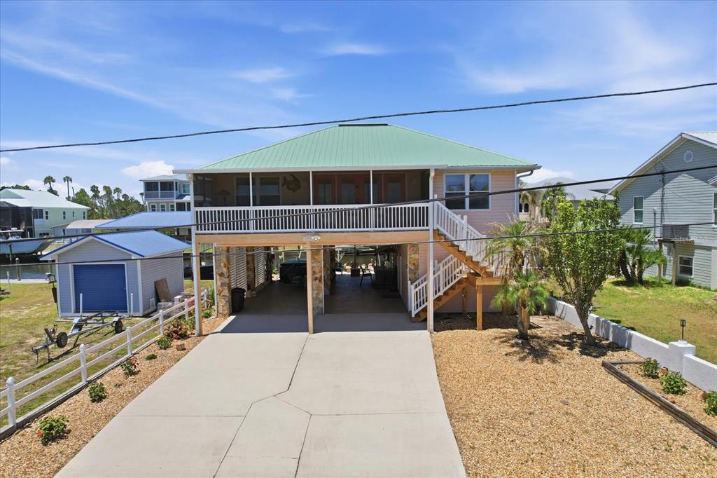 2882 North Comanche Point Crystal River, FL 34429 - Photo 29 of 39 a view of a house with a patio