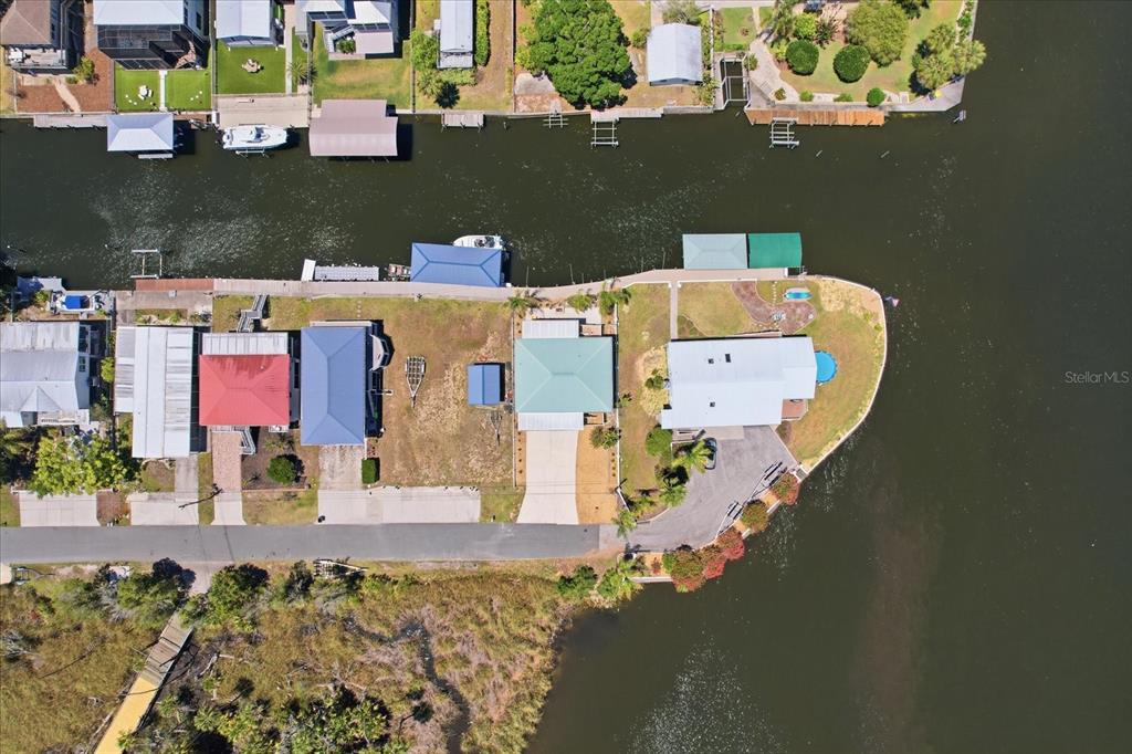 2882 North Comanche Point Crystal River, FL 34429 - Photo 32 of 39 an aerial view of a house with a swimming pool