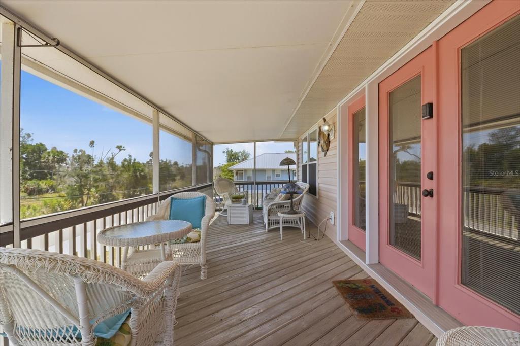 2882 North Comanche Point Crystal River, FL 34429 - Photo 36 of 39 a view of a chairs and table in the balcony