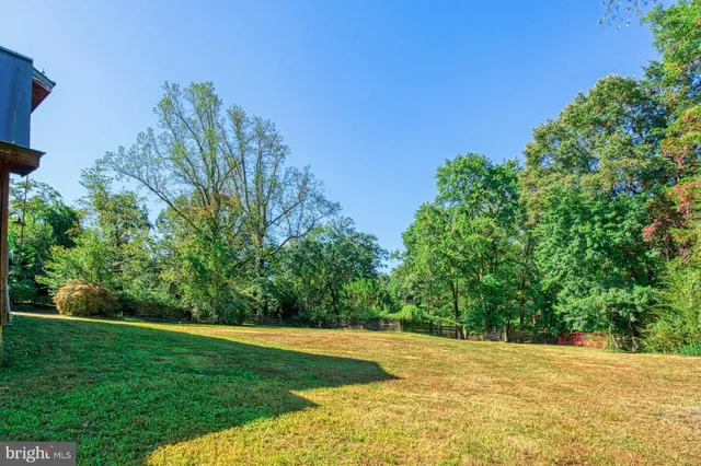 a view of swimming pool with an outdoor space and seating area