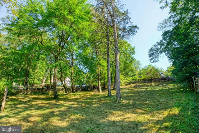a view of a house with a big yard