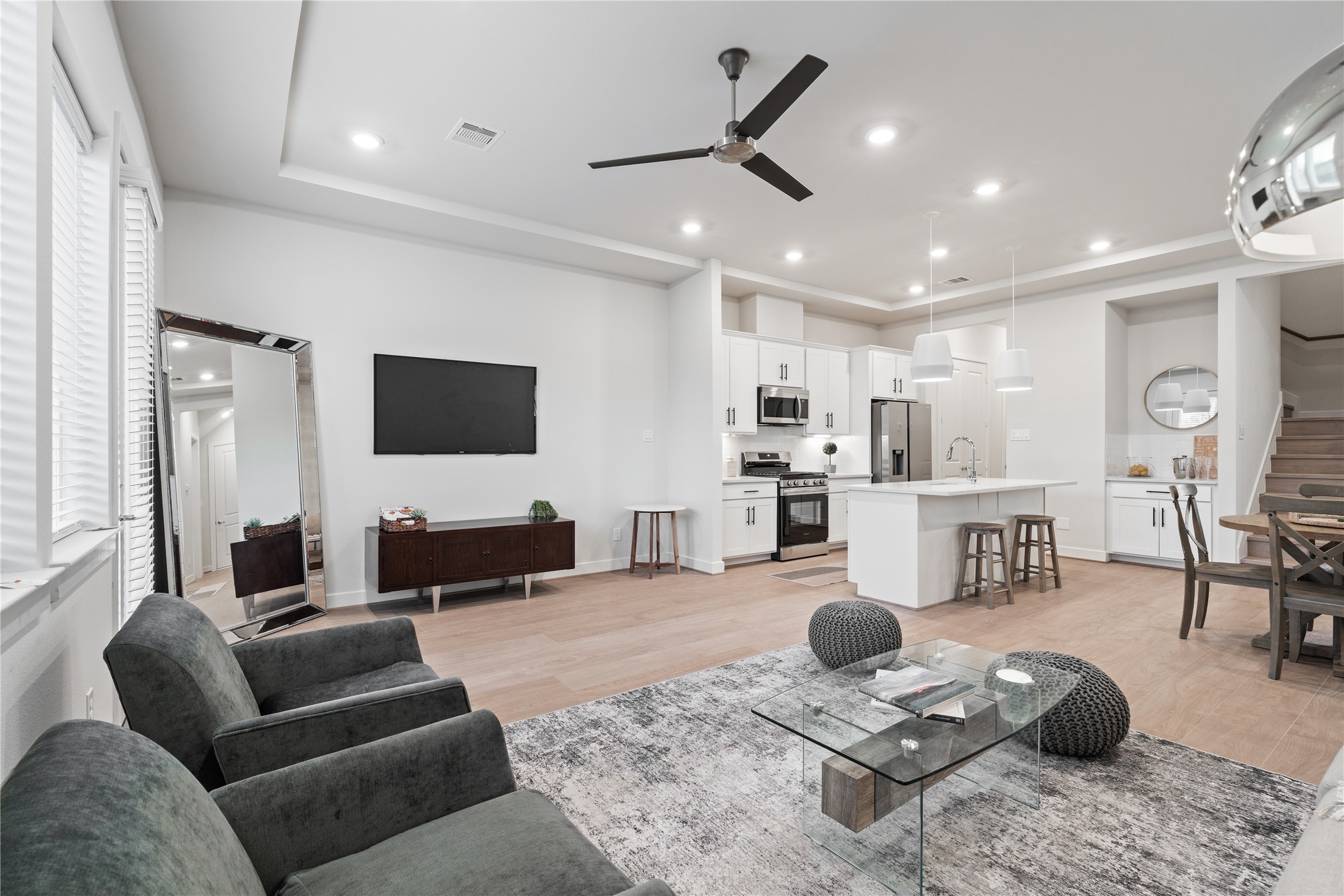 6451 Rena Street Houston, TX 77092 - Photo 14 of 33 Flexible media wall setup gives you options for how you arrange and anchor the space.