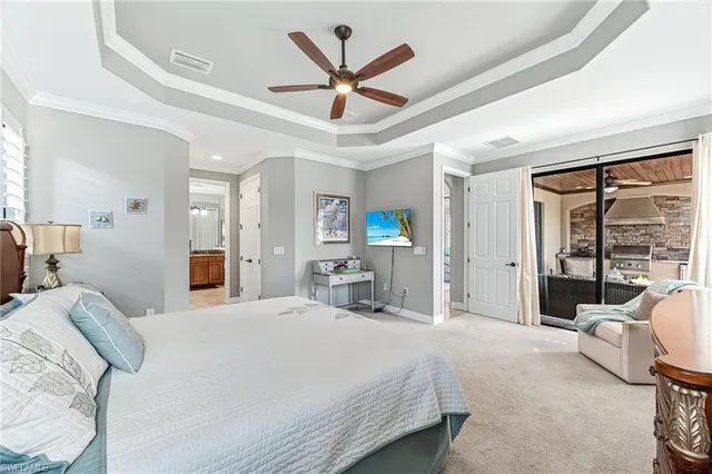 a bed room with a bed and a large window