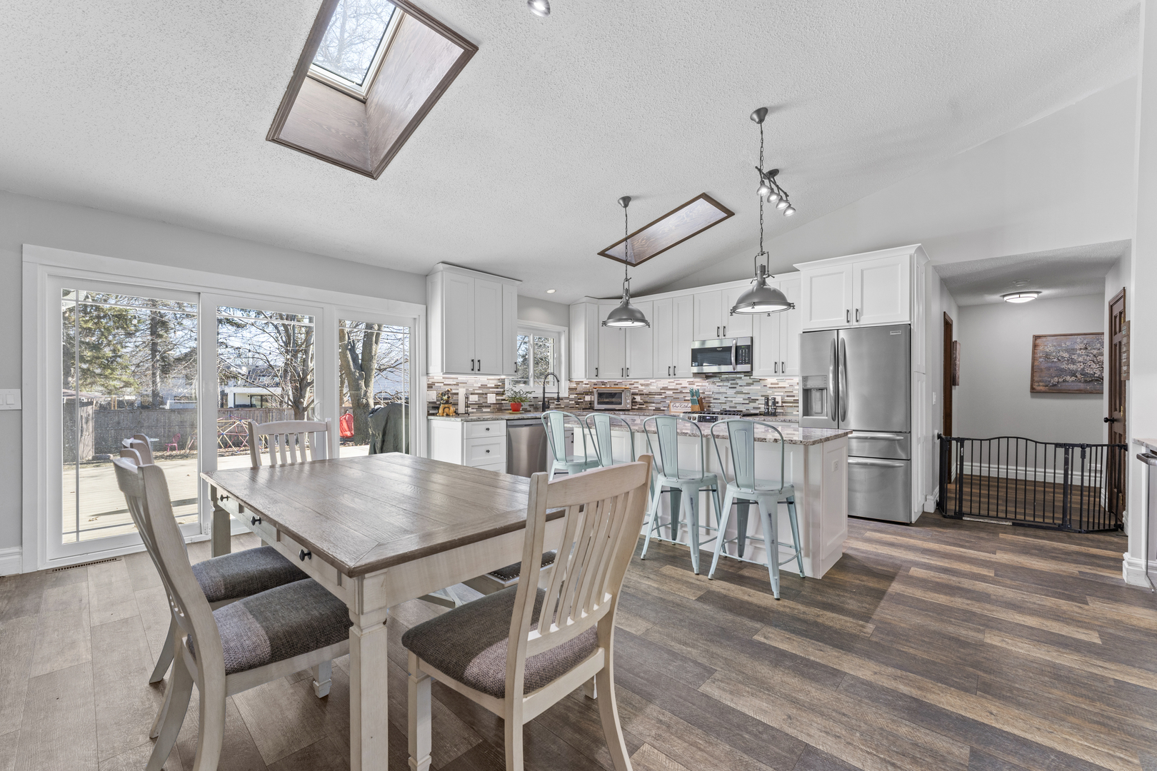 619 West End Road Roselle, IL 60172 - Photo 13 of 37 a dining room with furniture and wooden floor