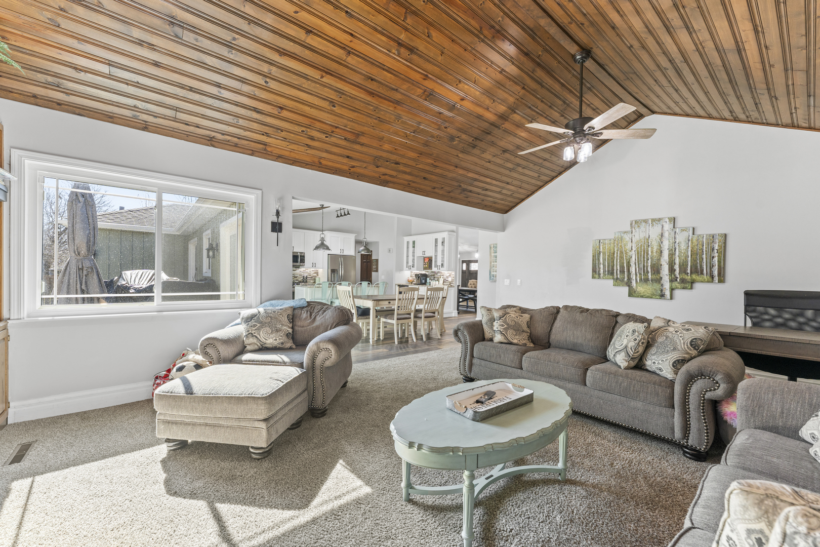 619 West End Road Roselle, IL 60172 - Photo 18 of 37 a living room with furniture and a large window
