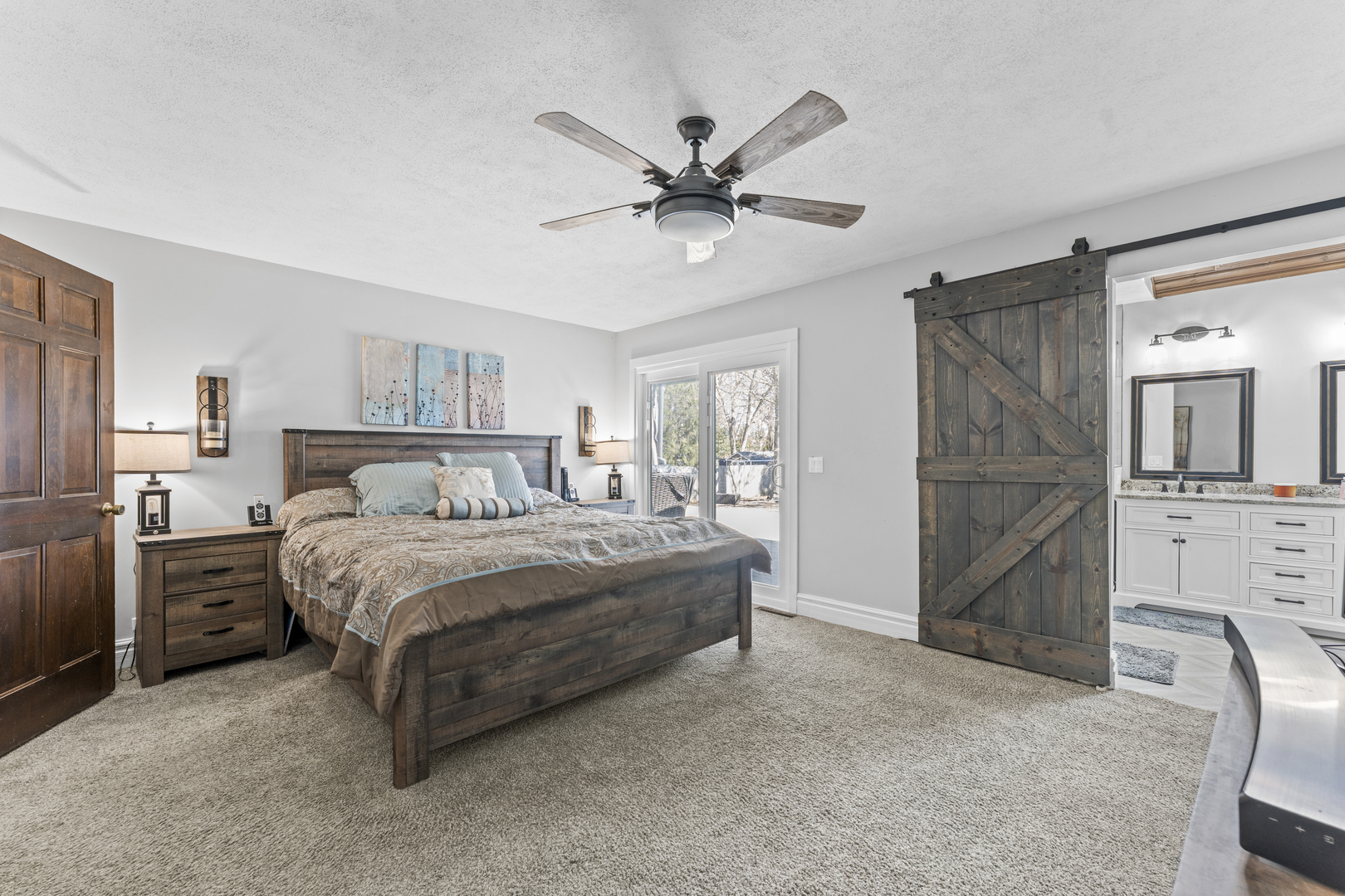 619 West End Road Roselle, IL 60172 - Photo 19 of 37 a bedroom with a bed and ceiling fan
