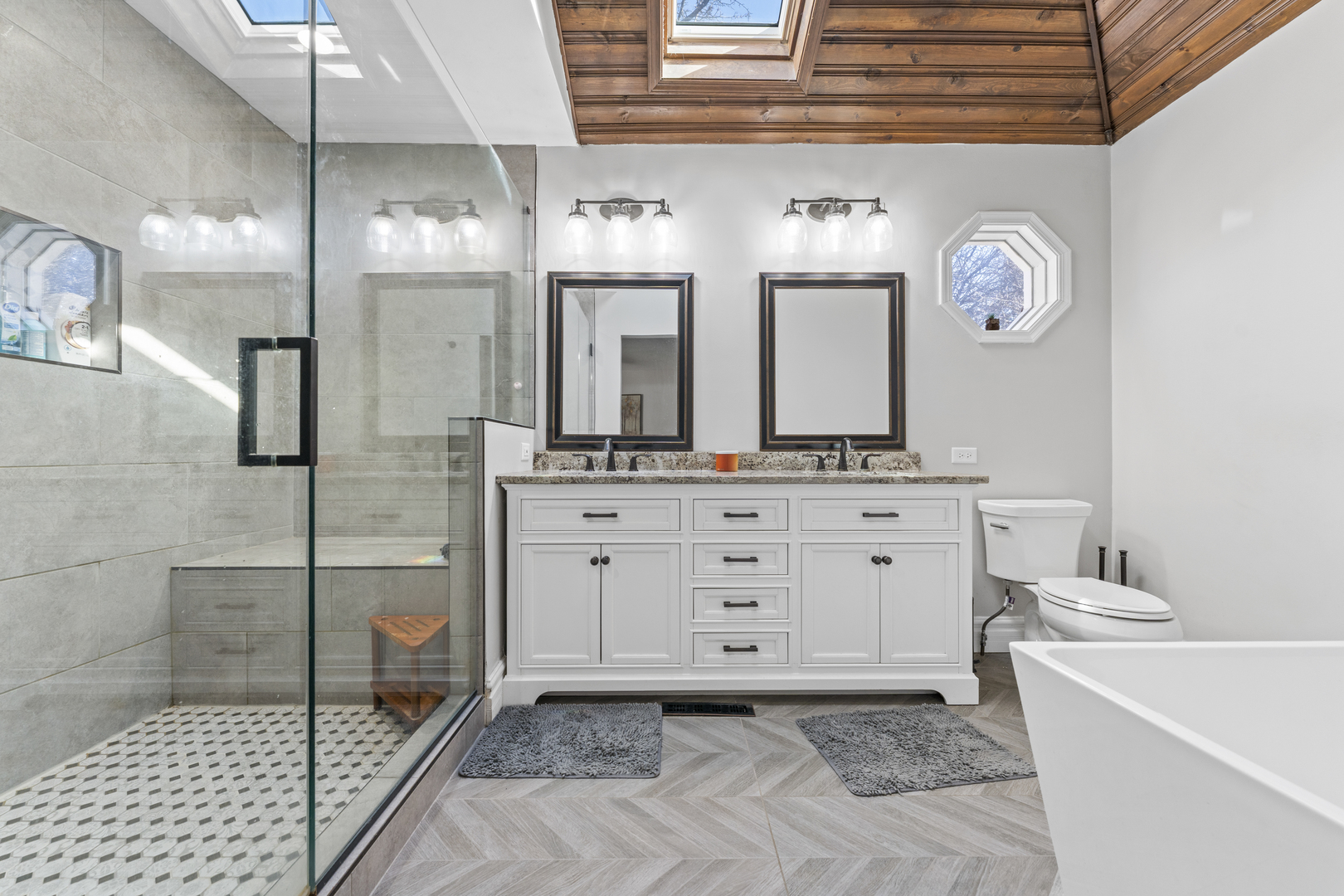 619 West End Road Roselle, IL 60172 - Photo 20 of 37 a bathroom with a sink a toilet and shower
