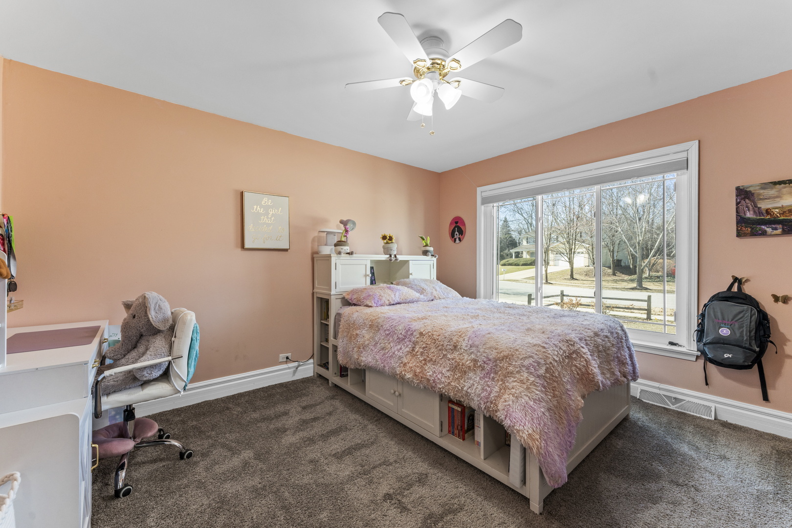 619 West End Road Roselle, IL 60172 - Photo 23 of 37 a bedroom with a bed and a large window