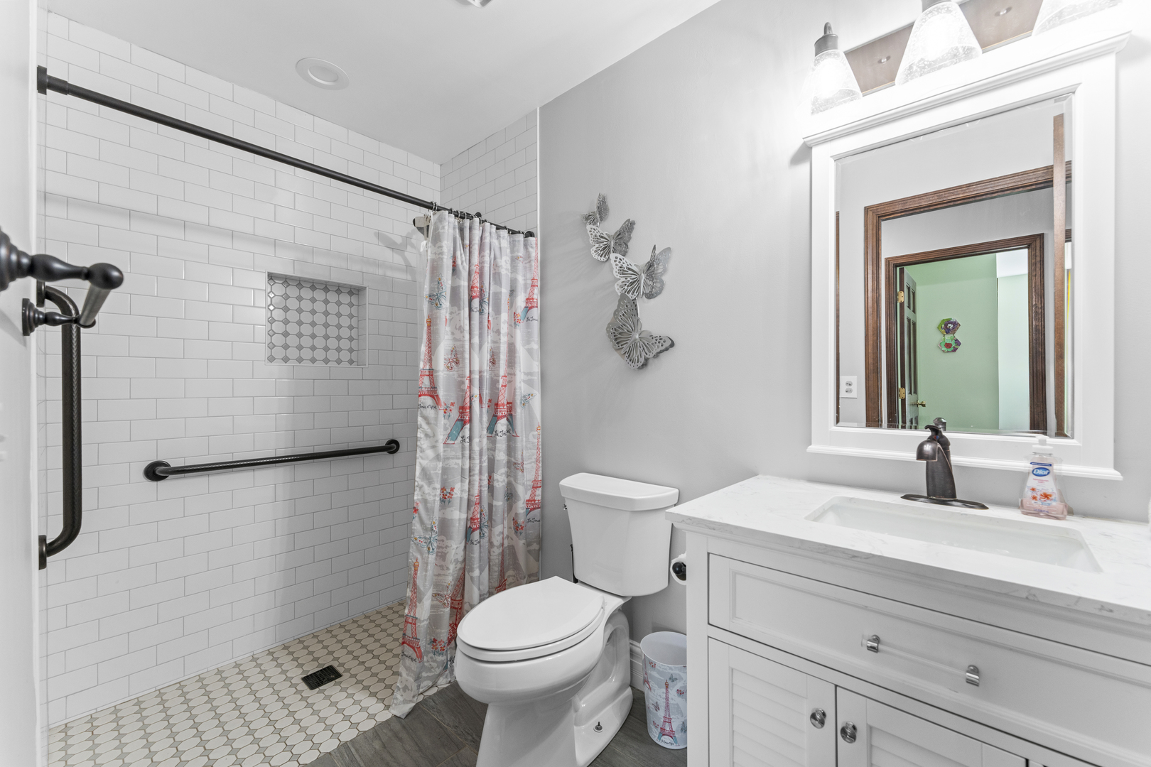 619 West End Road Roselle, IL 60172 - Photo 24 of 37 a bathroom with a sink toilet and shower