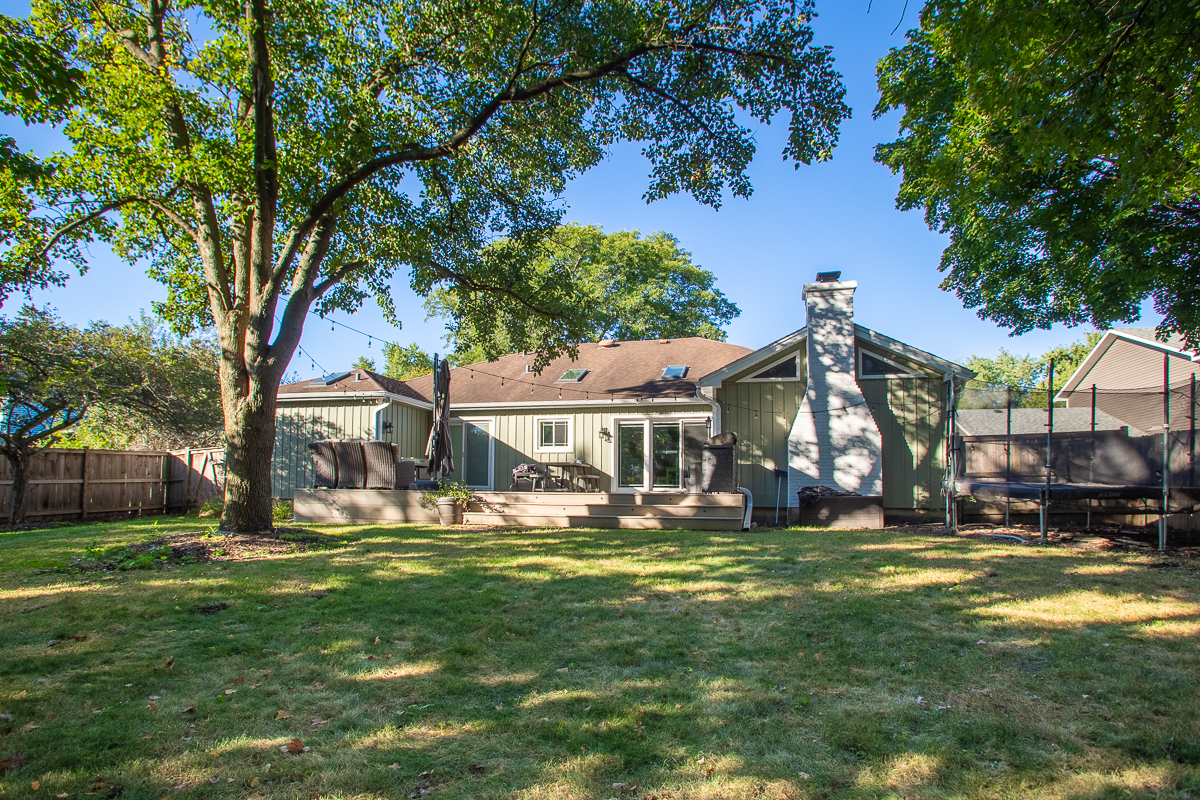 619 West End Road Roselle, IL 60172 - Photo 4 of 37 a view of a house with a yard