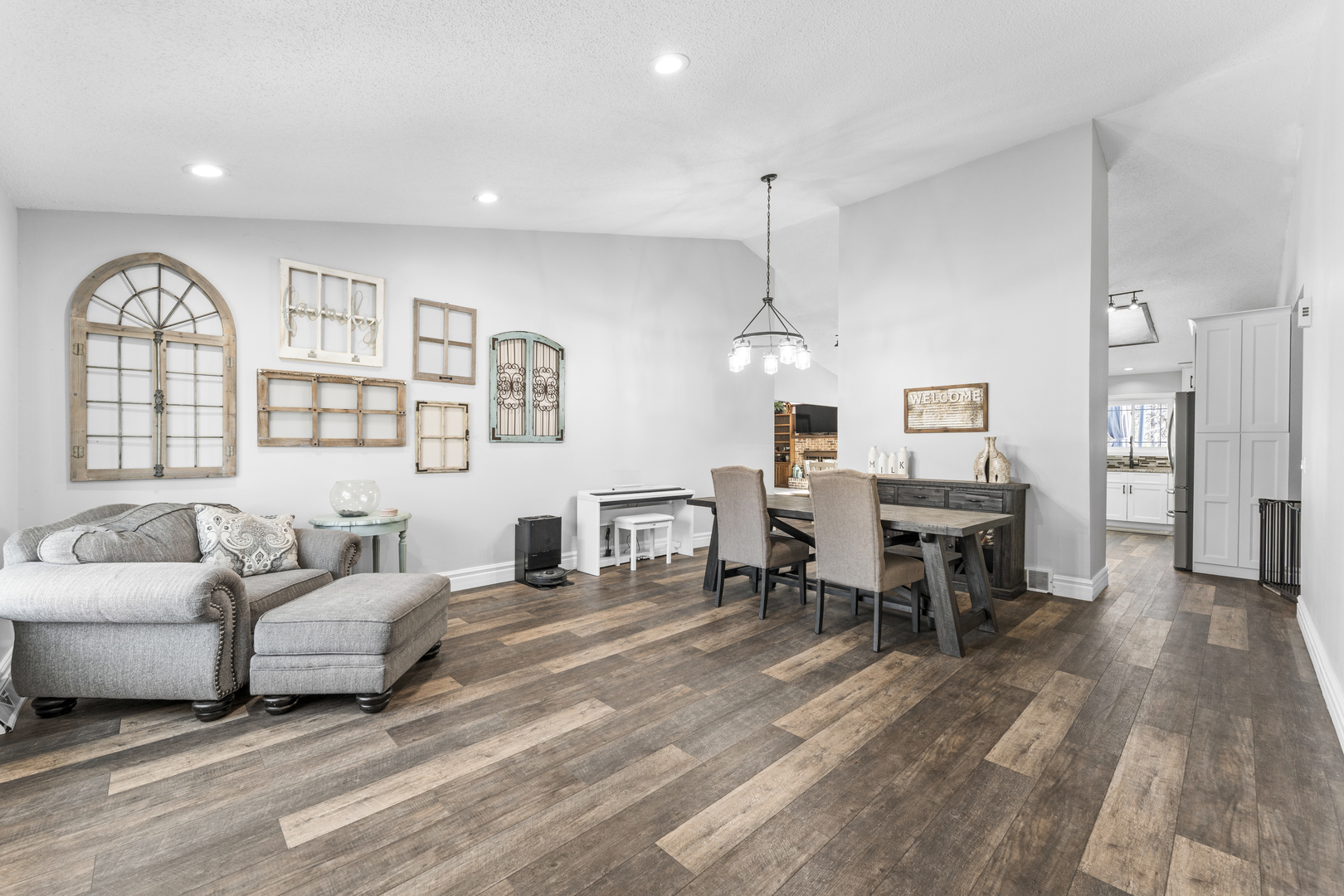619 West End Road Roselle, IL 60172 - Photo 9 of 37 a living room with furniture and a chandelier