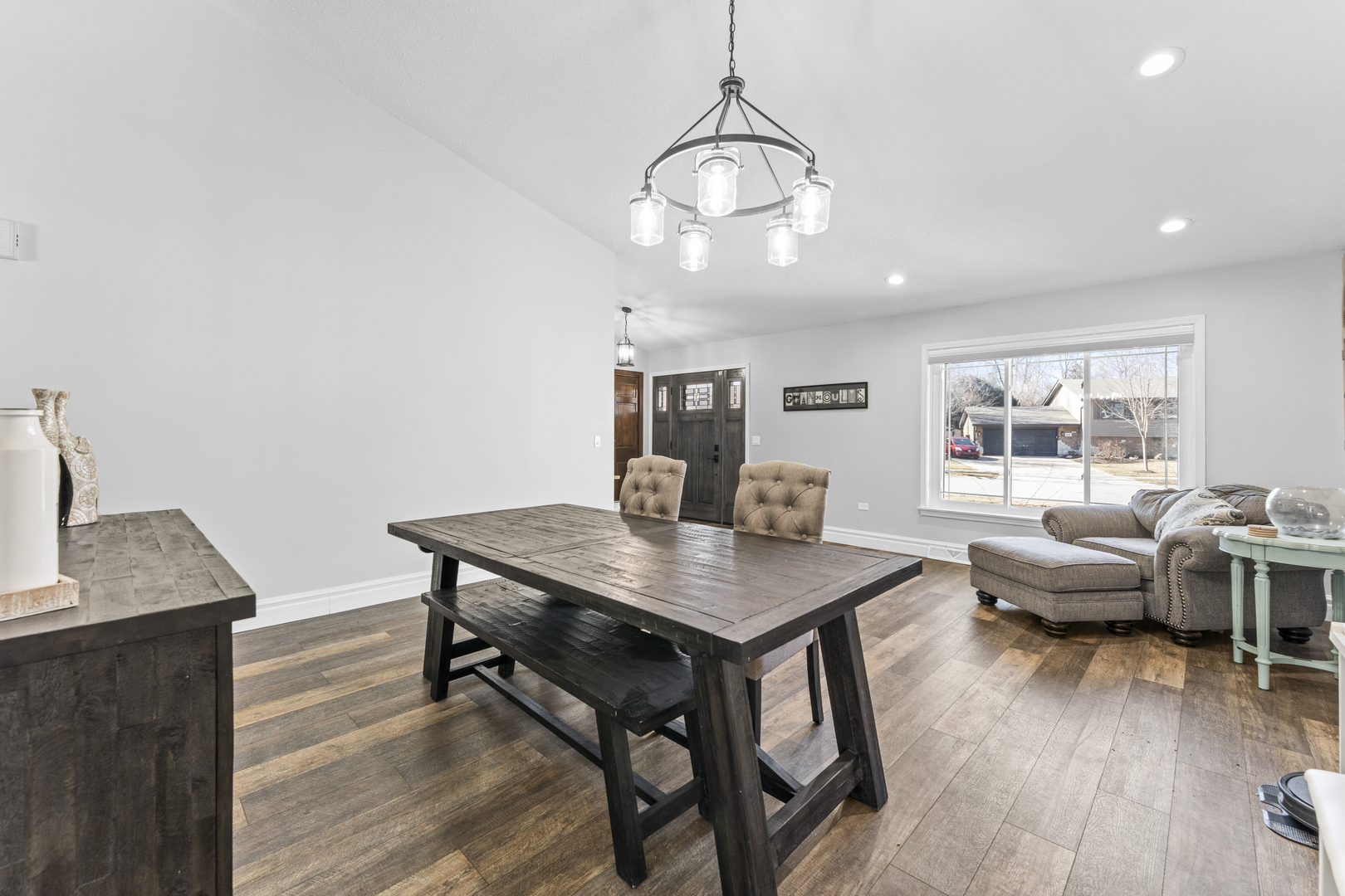 619 West End Road Roselle, IL 60172 - Photo 10 of 37 a view of a dining room with furniture window and wooden floor