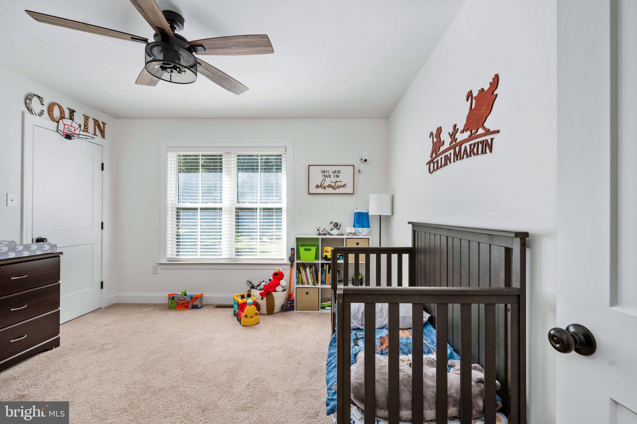 5712 Buckner Road Bumpass, VA 23024 - Photo 27 of 59 a bedroom with furniture wooden floor and windows