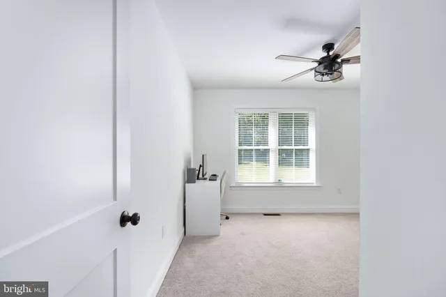 a view of a lake with a yard