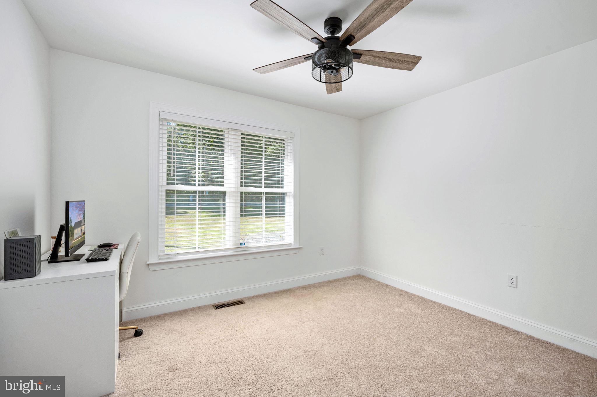 5712 Buckner Road Bumpass, VA 23024 - Photo 29 of 59 an empty room with a window
