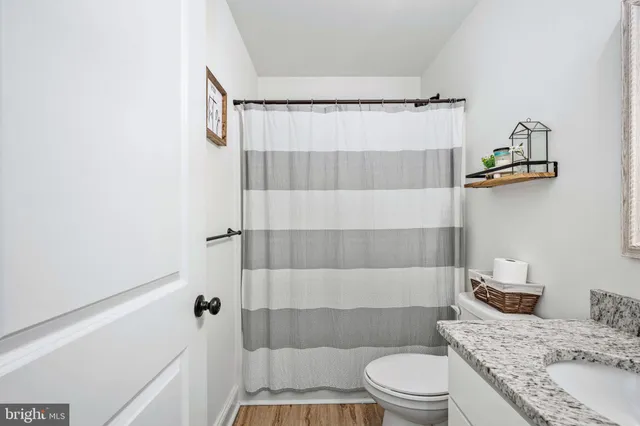 a view of a tiny house with a yard