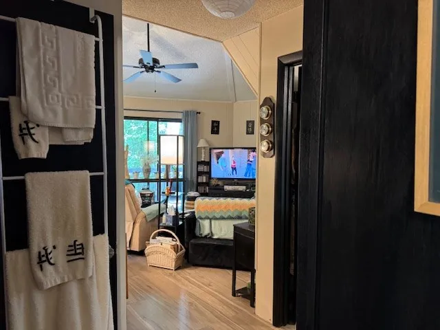 view of living room with furniture and floor to ceiling window