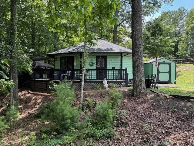 a backyard of a house with lots of green space