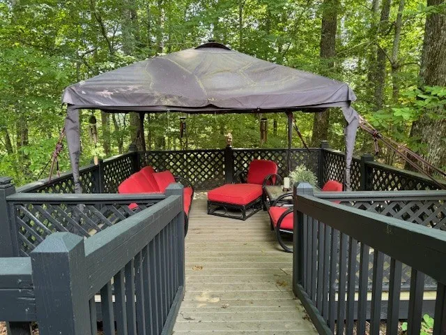 a view of outdoor kitchen and outdoor seating