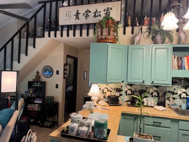 a front view of a house with parking area