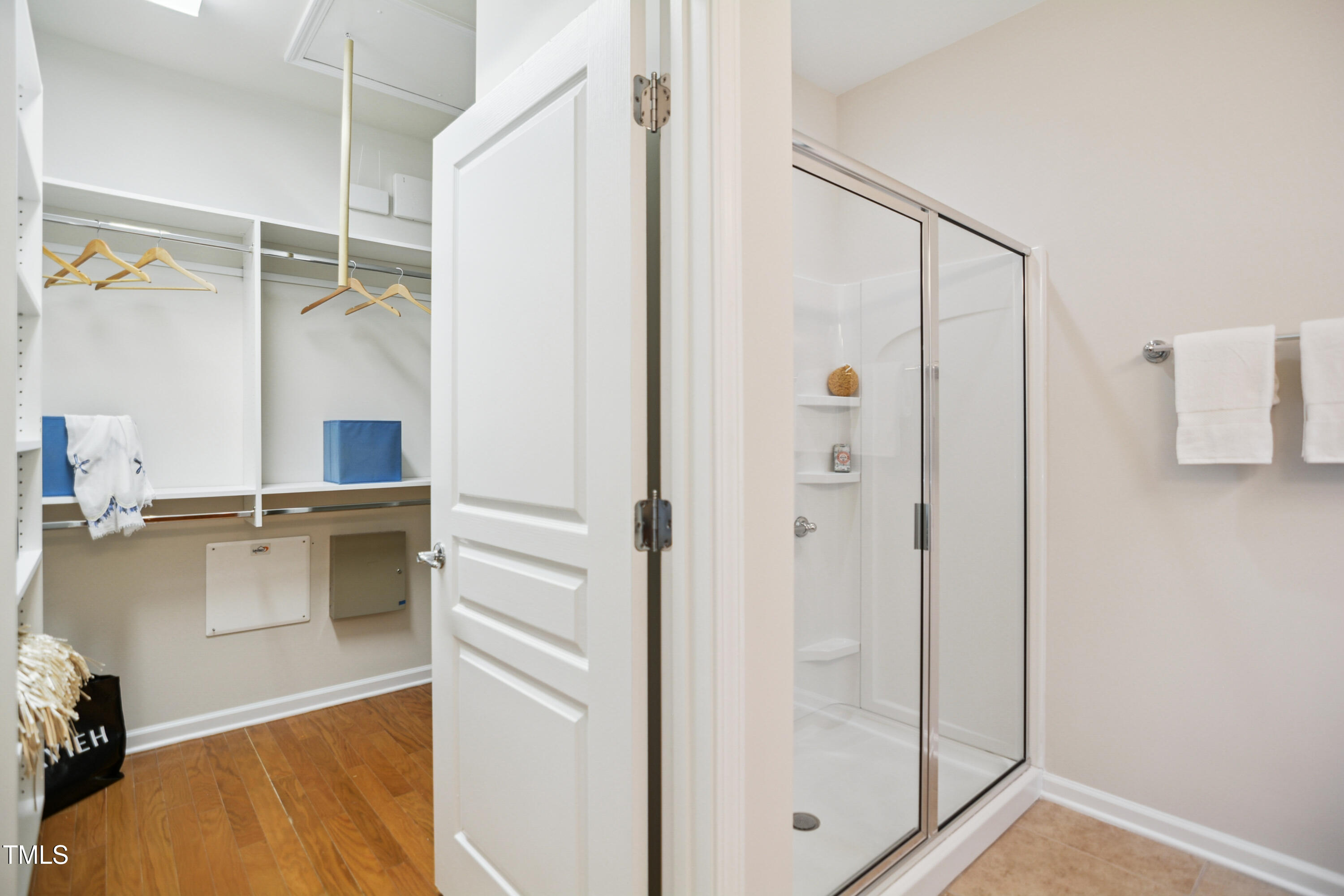 563 Tomkins Loop Cary, NC 27519 - Photo 16 of 26 a bathroom with a tub and shower